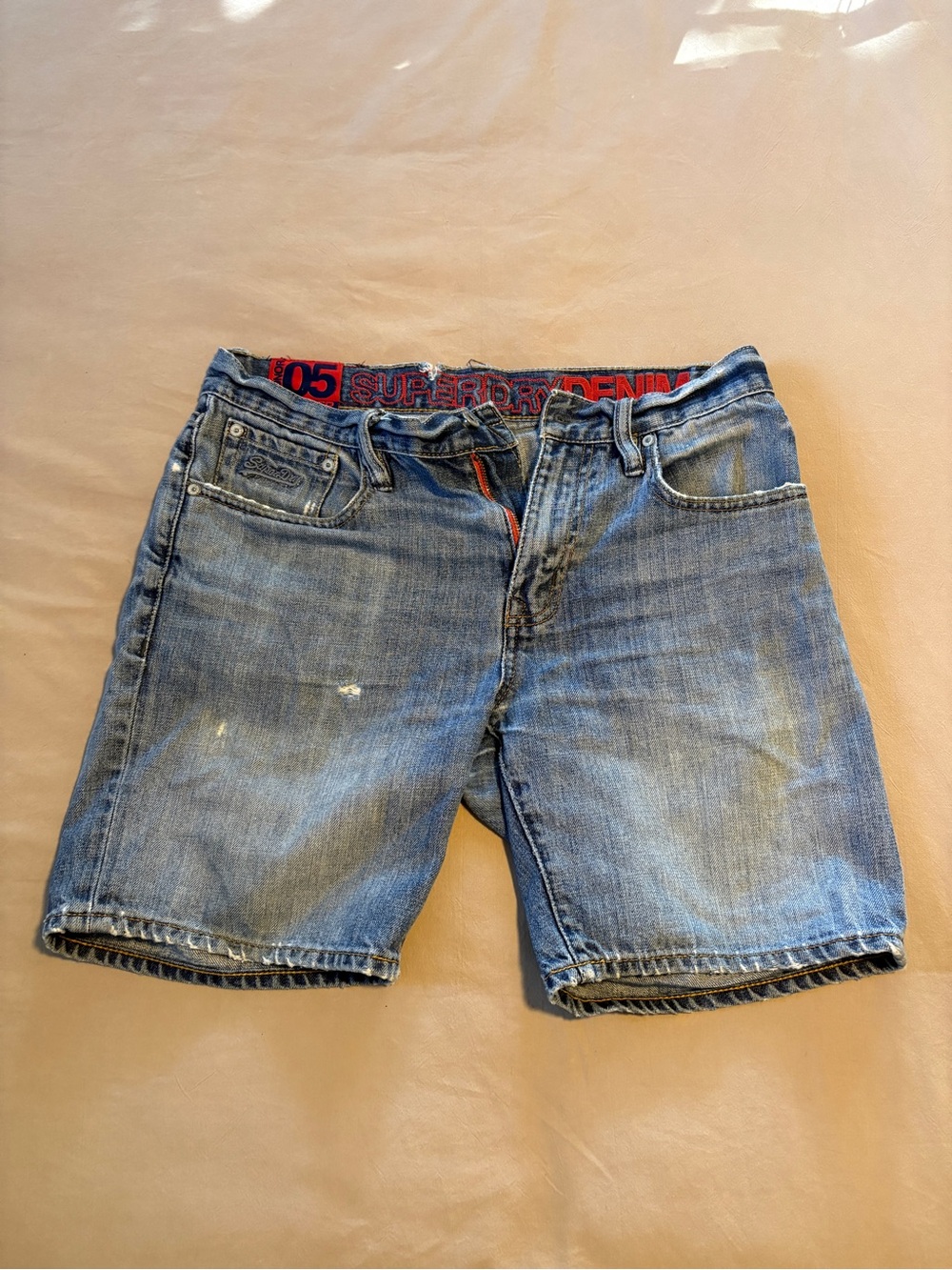 Superdry Men’s Blue Washed Denim Shorts with Red Waistband Detail